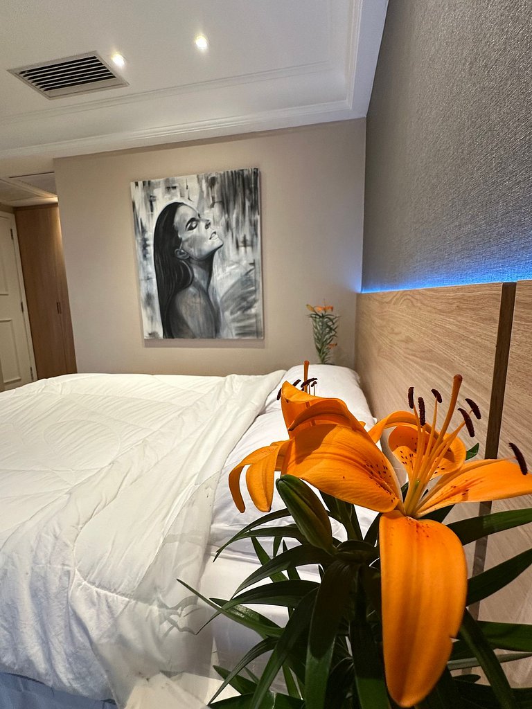 Suíte com Varanda e Vista Mar